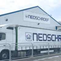 Nedschroef fabrik i Langeskov med en lastbil i forgrunden med Nedscrhoef logo